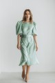 Сукня атласна кольору фісташка з поясом [025-0224]