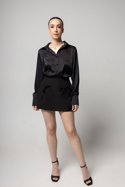 Шорты-юбка черного цвета с бантиками [130-0225]